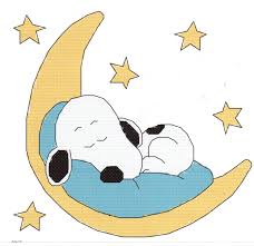 Imagen de Snoopy durmiendo sobre la luna
